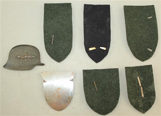 A German Third Reich Demjansk arm shield badge,